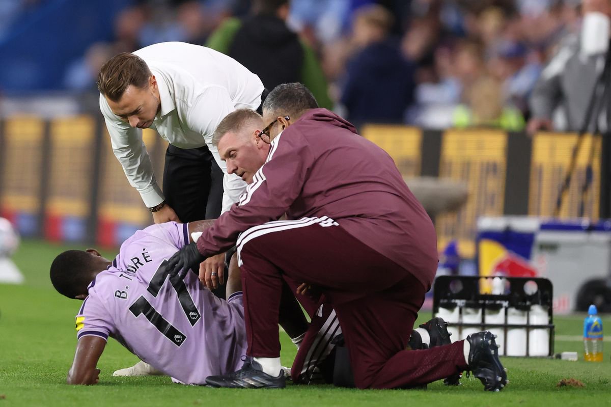  Newcastle United head coach Matthias Jaissle checks on Bazoumana Toure as he receives treatment