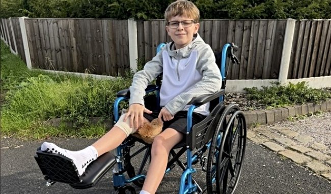 Ollie Wharton in wheelchair