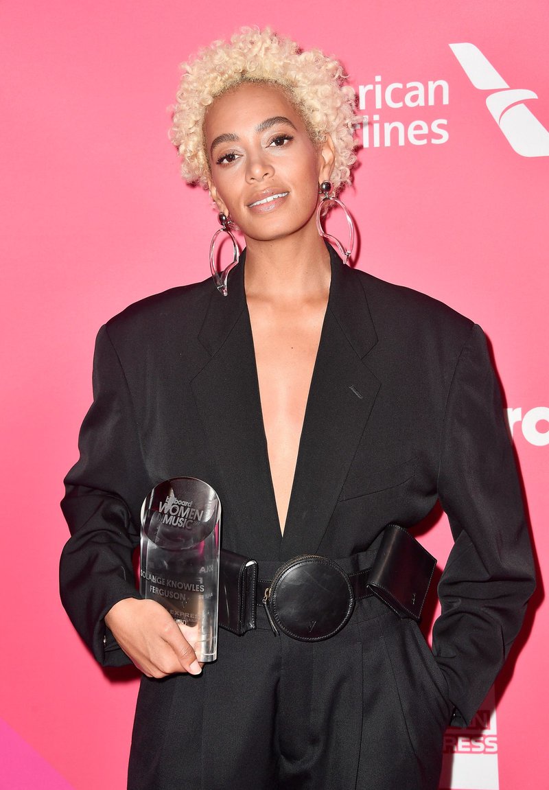 Solange Knowles in a blonde afro