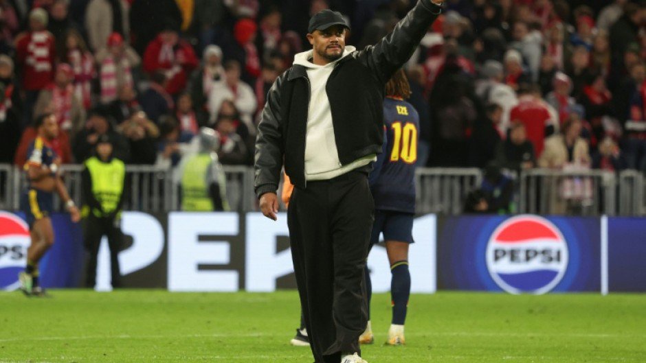 Vincent Kompany waves to fans after Bayern Munich drew with Arsenal in the Champions League on Wednesday