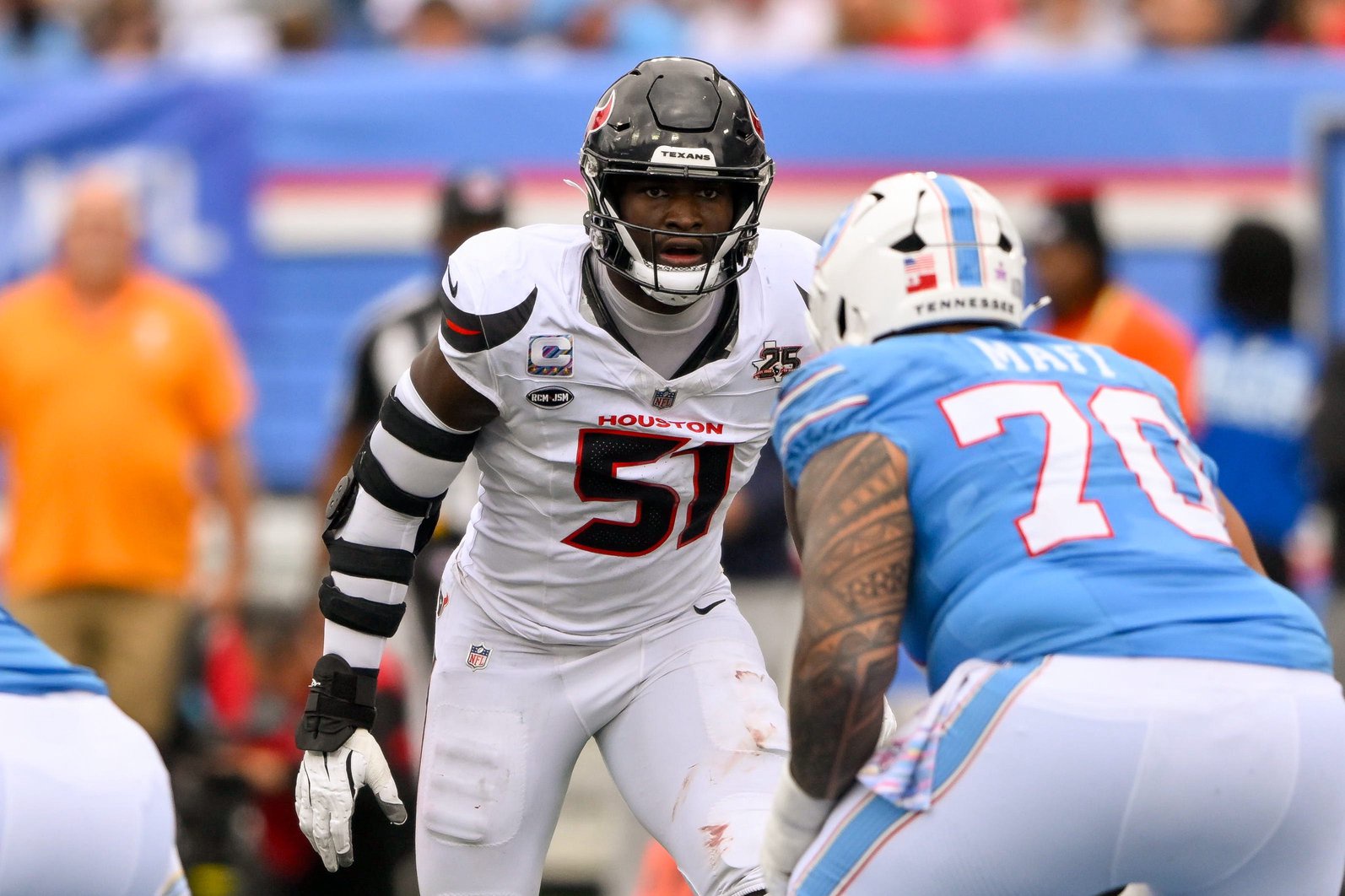 Oct 11, 2026; Nashville, Tennessee, USA;  Houston Texans defensive end Will Anderson Jr. (51) sneaks a peak into the backfield against the Tennessee Titans during the second half at Nissan Stadium. Mandatory Credit: Steve Roberts-Imagn Images