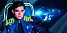 Chris Pine sits in the captain's chair in Star Trek Beyond