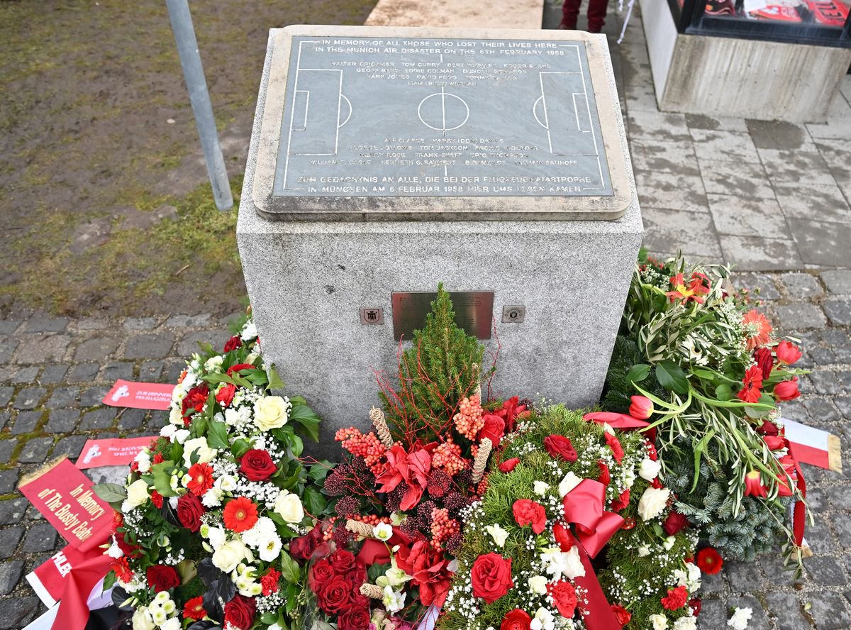 Flowers and wreaths are seen after the commemoration for the 68th Anniversary of the Munich Air Disaster at the Manchesterplatz Memorial on February 06, 2026 in Munich