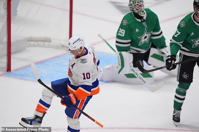 New York Islanders center Brayden Schenn (10) reacts after scoring against Dallas Stars goaltender Jake Oettinger (29) during the second period of an NHL hockey game Sunday, Oct. 25, 2026, in Dallas. (AP Photo/LM Otero)