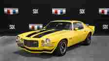 yellow 1970 Chevrolet Camaro Z28 Hurst Sunshine Special parked indoors