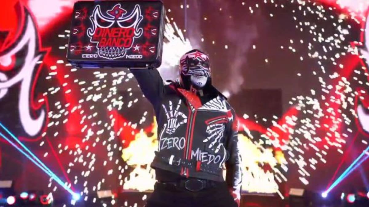 Penta with Mr. Money in the Bank briefcase