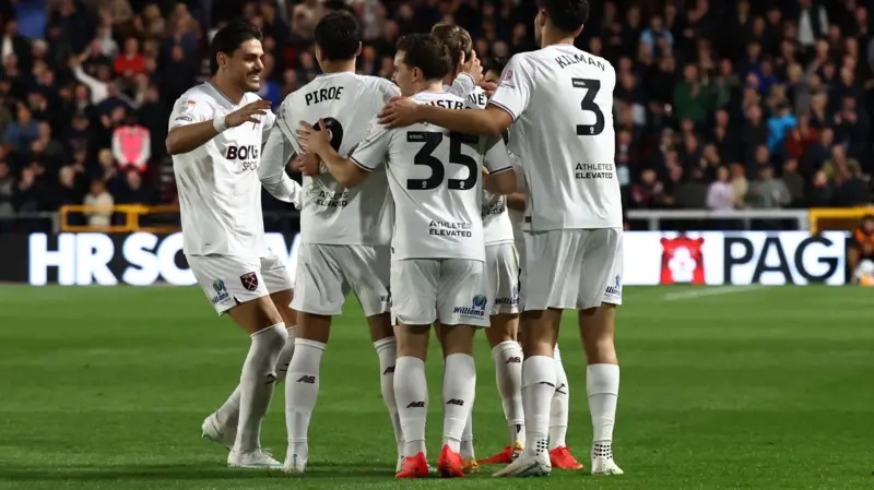 West Ham celebrate scoring a third goal
