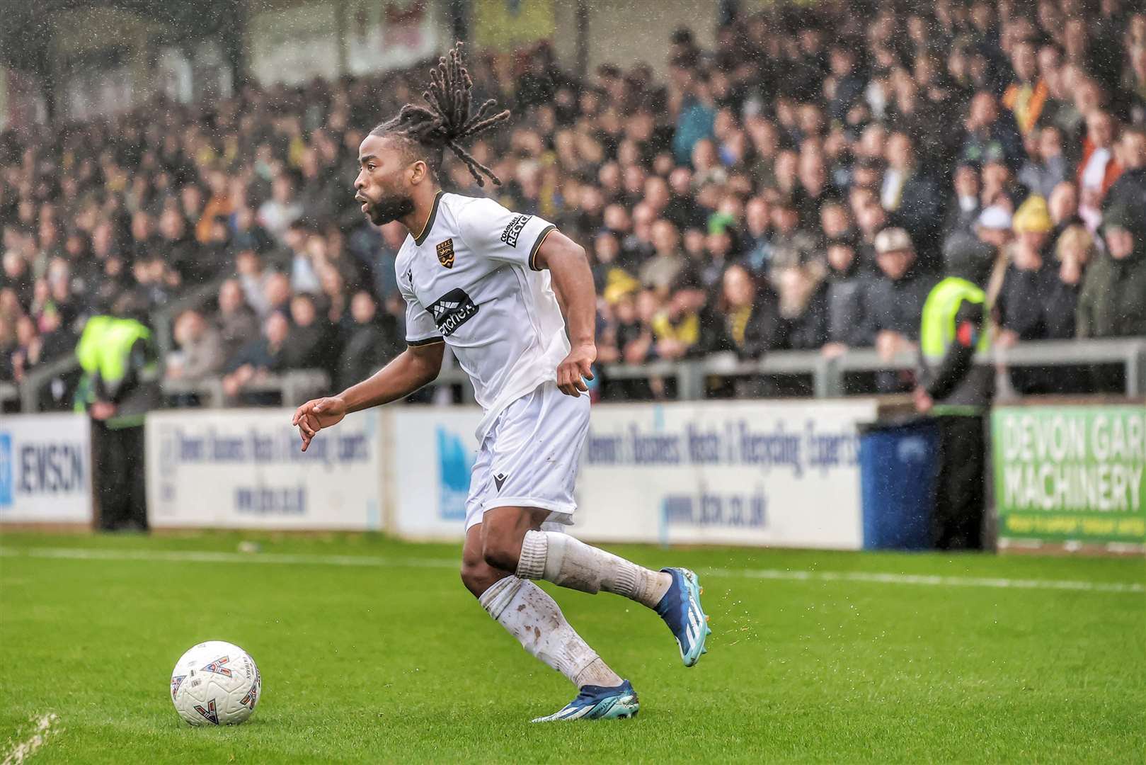 Maidstone full-back Dermi Lusala gets forward at Plainmoor. Picture: Helen Cooper