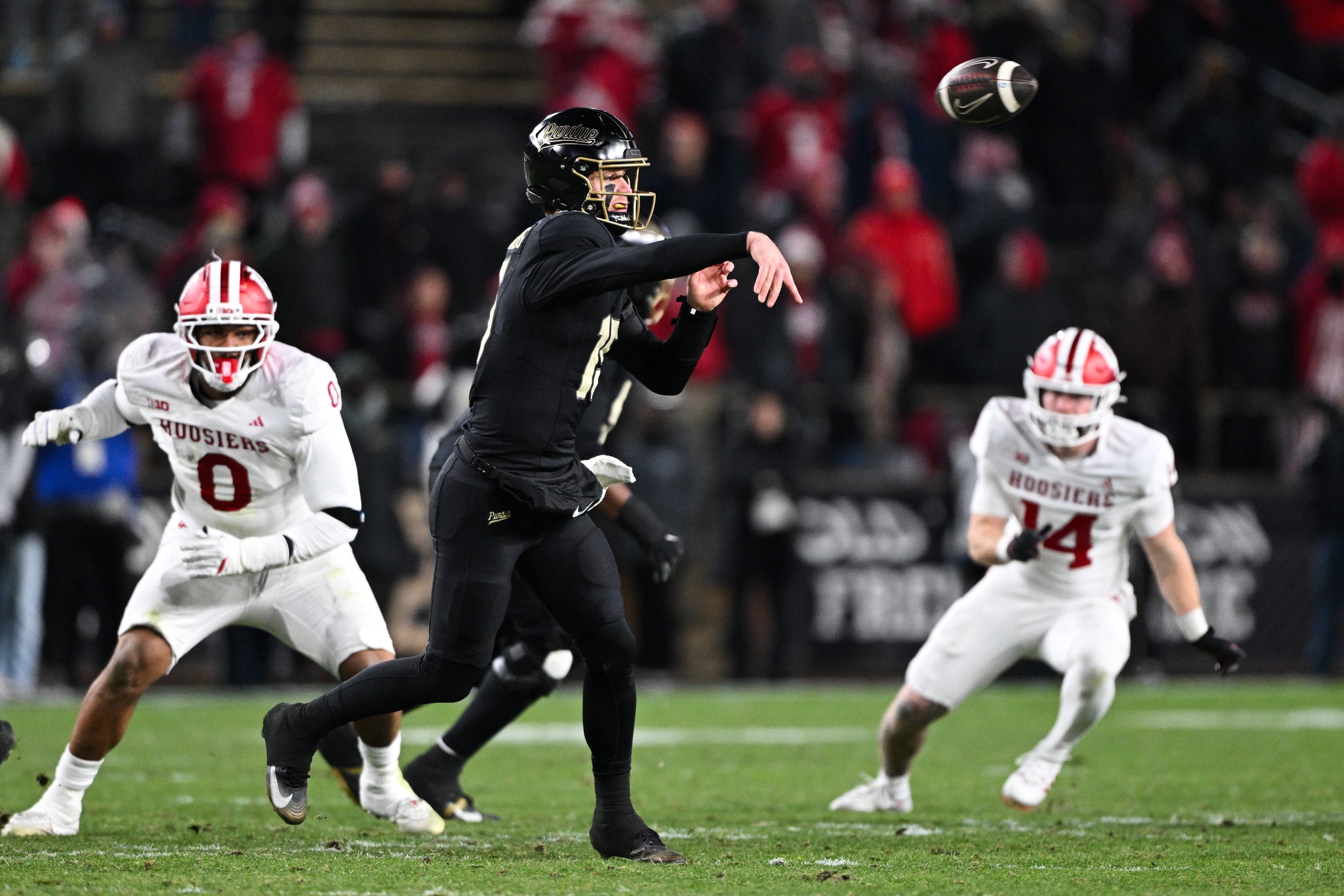 Nov 28, 2025; West Lafayette, Indiana, USA; Purdue Boilermakers quarterback Ryan Browne (15) throws a pass during the fourth quarter against the Indiana Hoosiers at Ross-Ade Stadium. Mandatory Credit: Marc Lebryk-Imagn Images