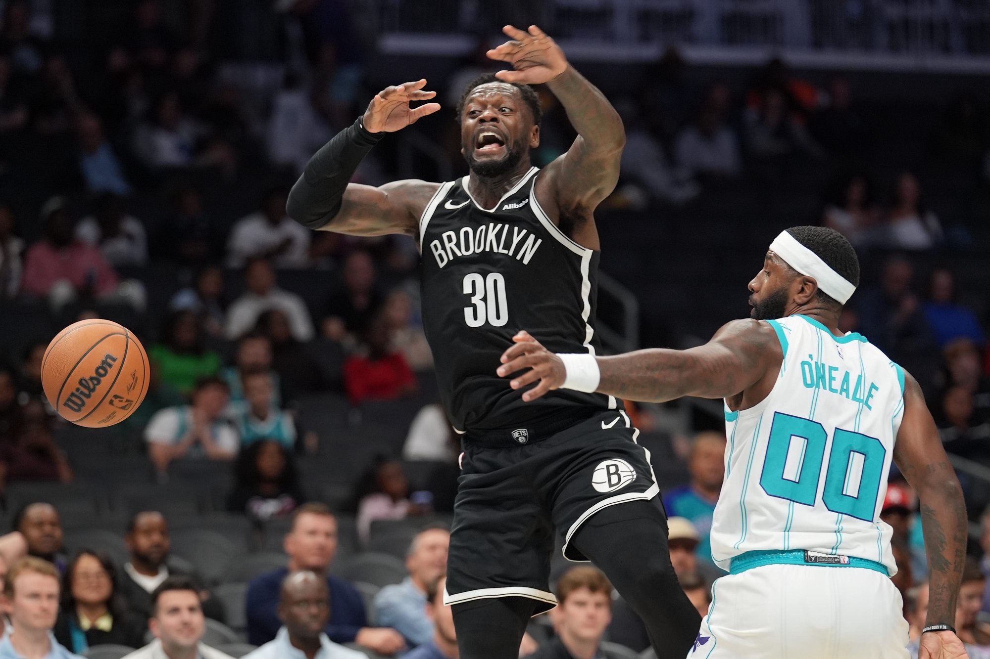 Oct 6, 2026; Charlotte, North Carolina, USA;  Brooklyn Nets forward Julius Randle (30) reacts to loosing the ball against Charlotte Hornets forward Royce O'Neale (00) during the second quarter at Spectrum Center.  Mandatory Credit: Jim Dedmon-Imagn Images