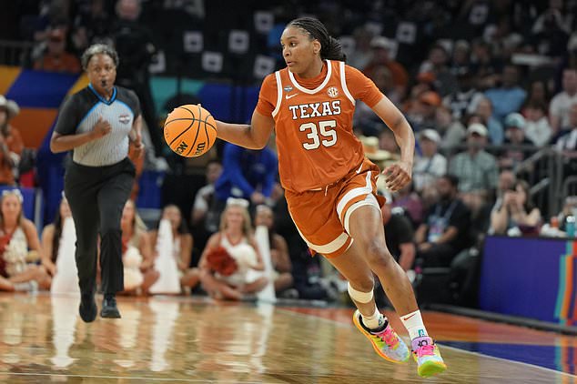 FILE - Texas forward Madison Booker during the first half of a women's NCAA college basketball tournament semifinal game against UCLA at the Final Four, April 3, 2026, in Phoenix. (AP Photo/Rick Scuteri, File)