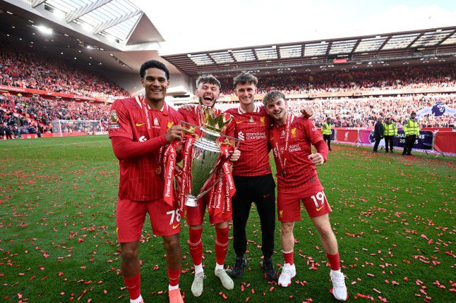 LIVERPOOL, ENGLAND - MAY 25: (THE SUN OUT. THE SUN ON SUNDAY OUT) Jarell Quansah, Conor Bradley, Tyler Morton and Harvey Elliott of Liverpool pose for a photograph with the Premier League trophy, as Liverpool are crowned the Champions of the Premier League for the 2024/25 Season, following the Premier League match between Liverpool FC and Crystal Palace FC at Anfield on May 25, 2025 in Liverpool, England. (Photo by Liverpool FC/Liverpool FC via Getty Images)