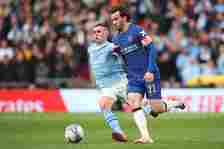 Phil Foden of Manchester City and Ben Chilwell of Chelsea challenge during the Emirates FA Cup Semi Final match between Manchester City and Chelsea...