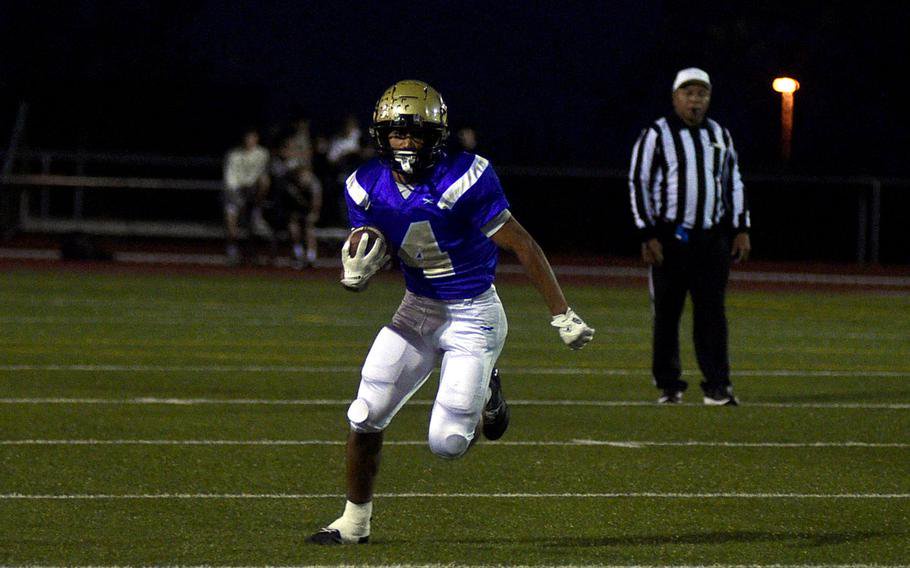 Alexander Varela runs for yards.