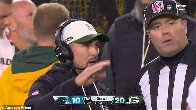 Packers head coach Matt LeFleur tries to get more information from officials during the pause