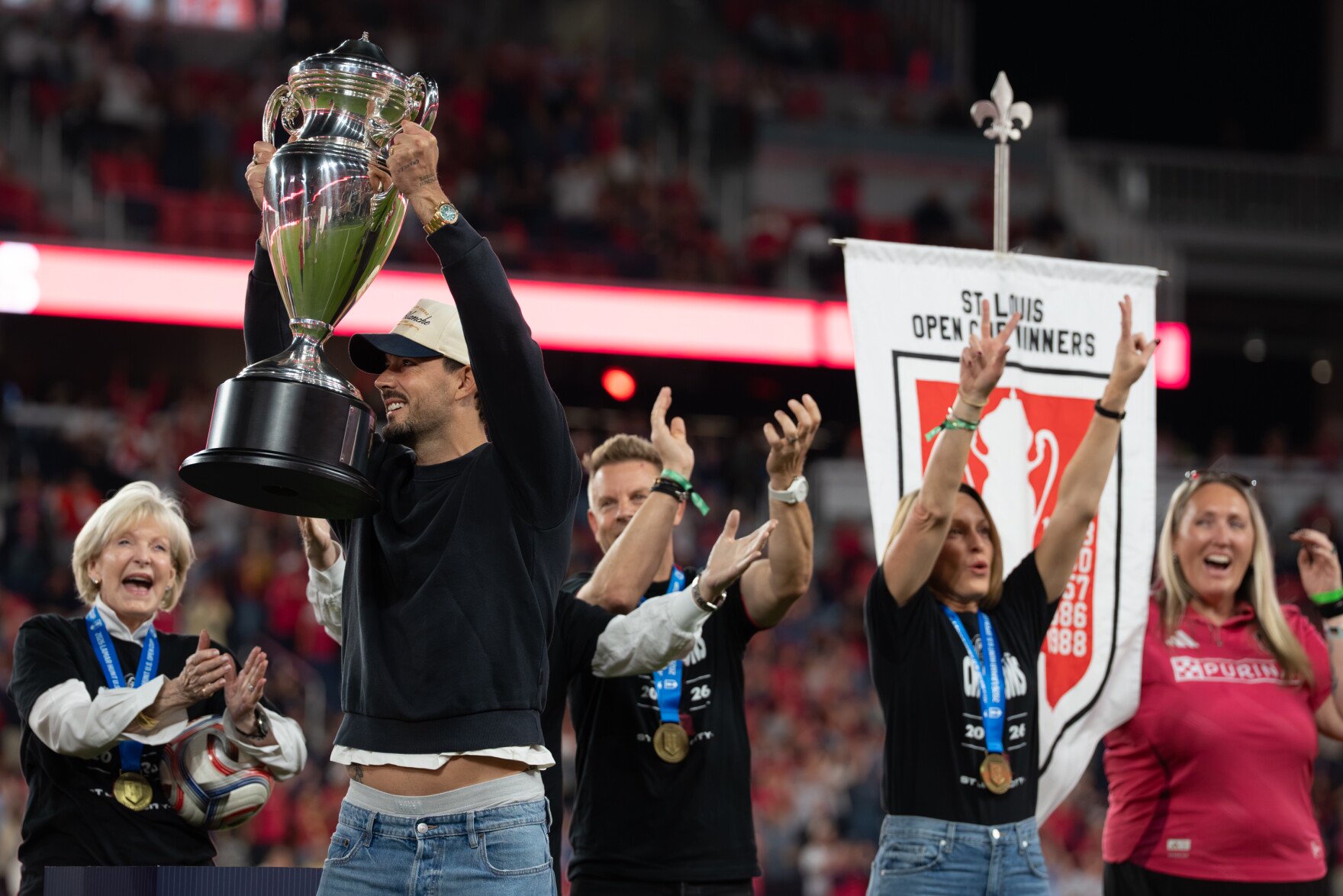 St. Louis City SC goalkeeper Roman Bürki hoists the Lamar Hunt U.S. Open Cup trophy in front of team owners during a pregame celebration on Wednesday, Oct. 28, 2026, at Energizer Park in St. Louis’ Downtown West neighborhood.