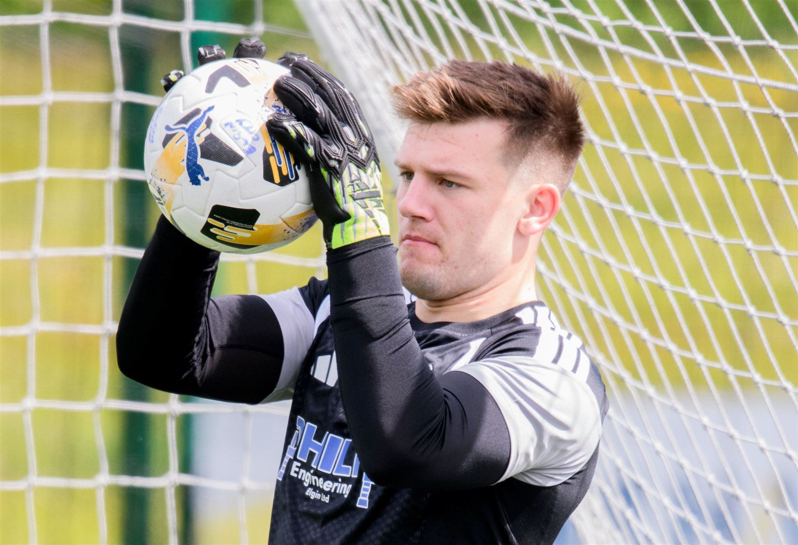 Tom Ritchie made tow good saves for Elgin. Picture: Daniel Forsyth.