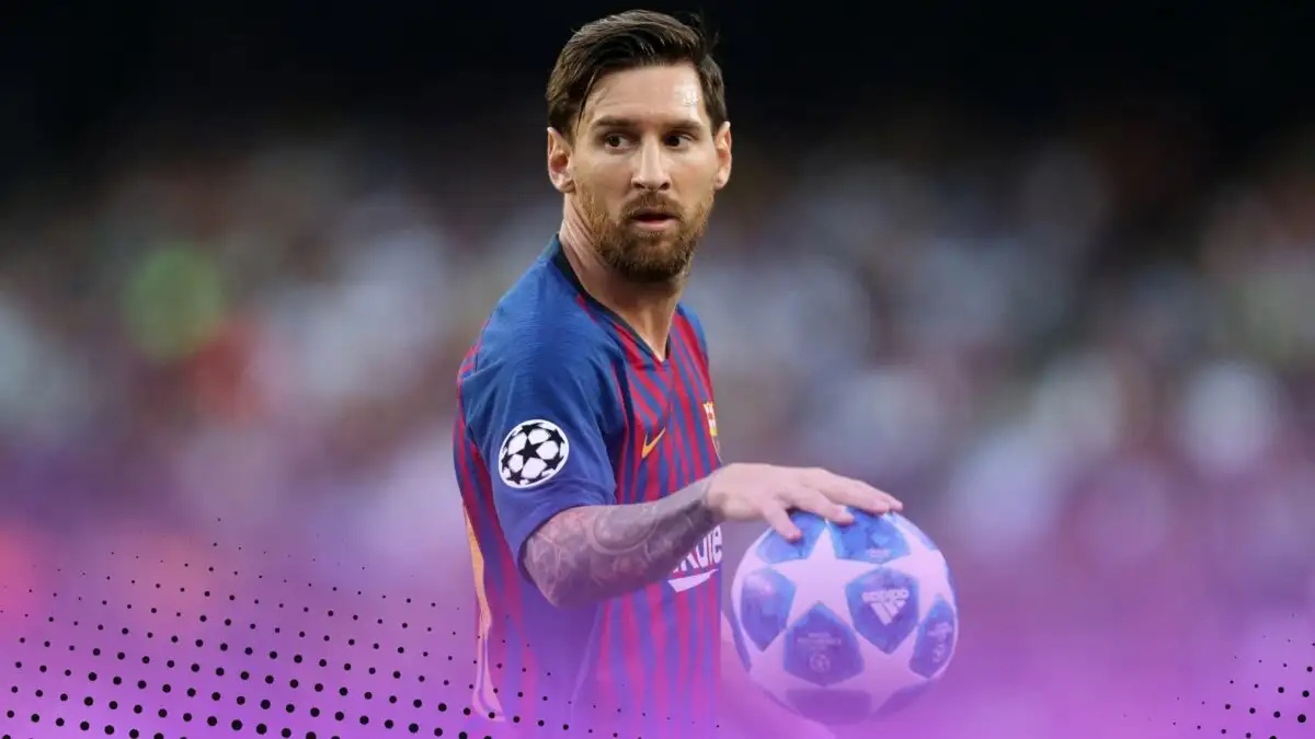 Lionel Messi with a Champions League ball