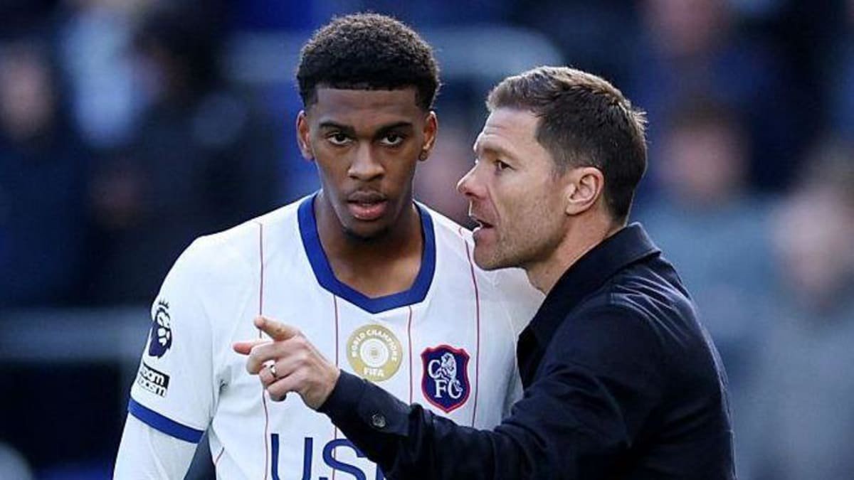 Josh Acheampong speaking to manager Xabi Alonso