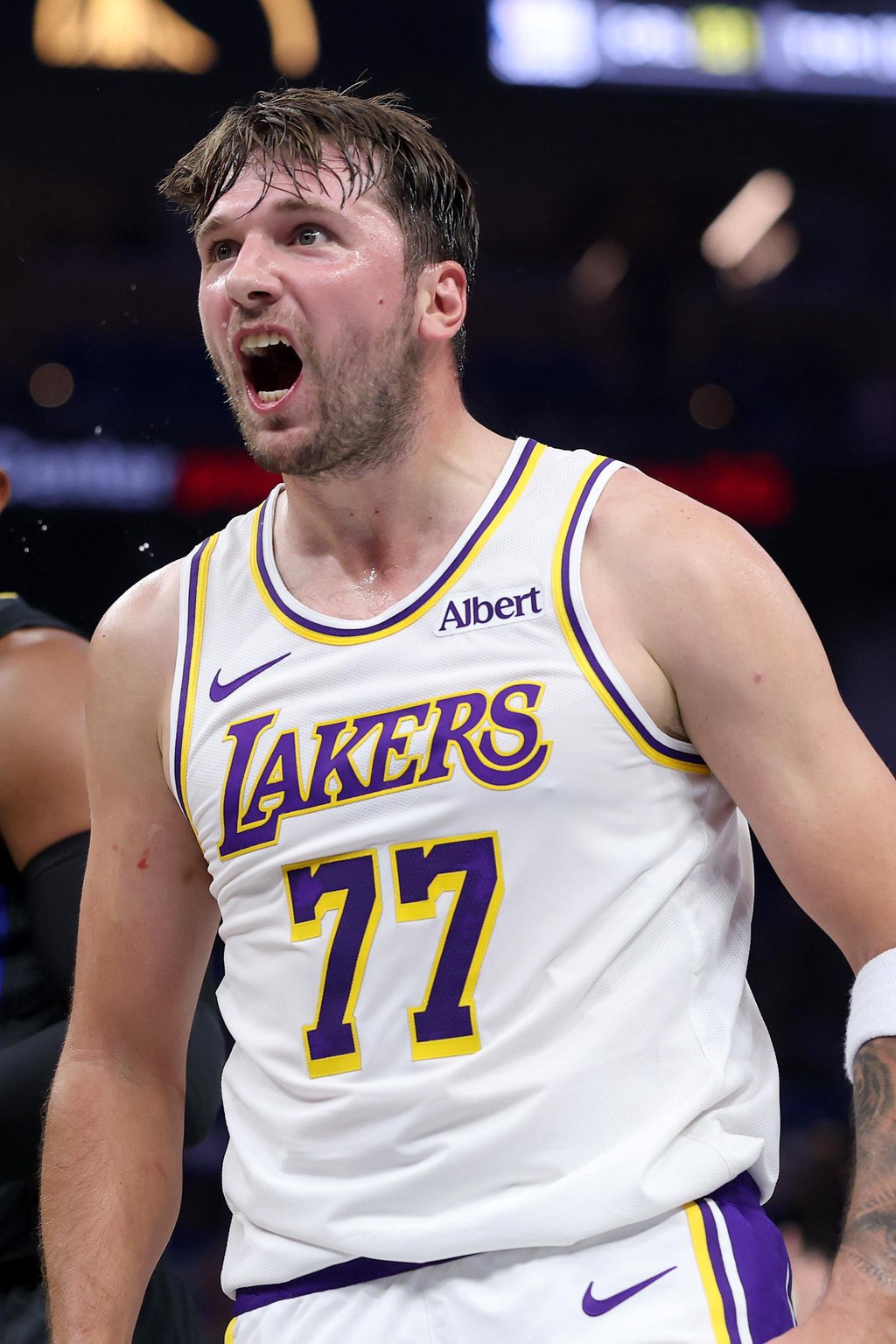 Luka Doncic of the Los Angeles Lakers reacts after making a basket during a game against the Golden State Warriors.