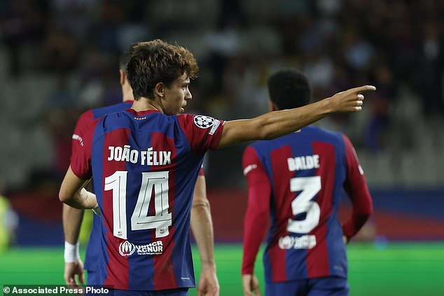 Barcelona's Joao Felix celebrates after scoring his side's opening goal during the Champions League Group H soccer match between Barcelona and Royal Antwerp at the Olympic Stadium of Montjuic in Barcelona, Spain, Tuesday, Sept. 19, 2023. (AP Photo/Joan Monfort)