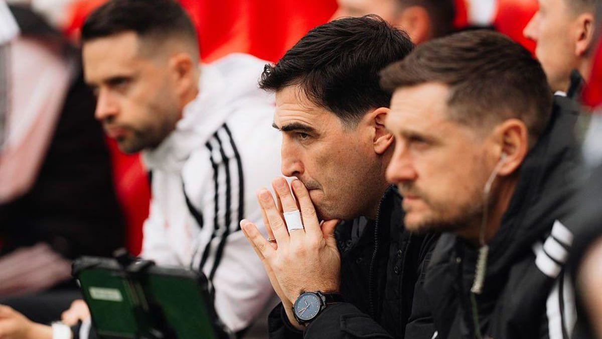 Liverpool boss Andoni Iraola sits in his dugout