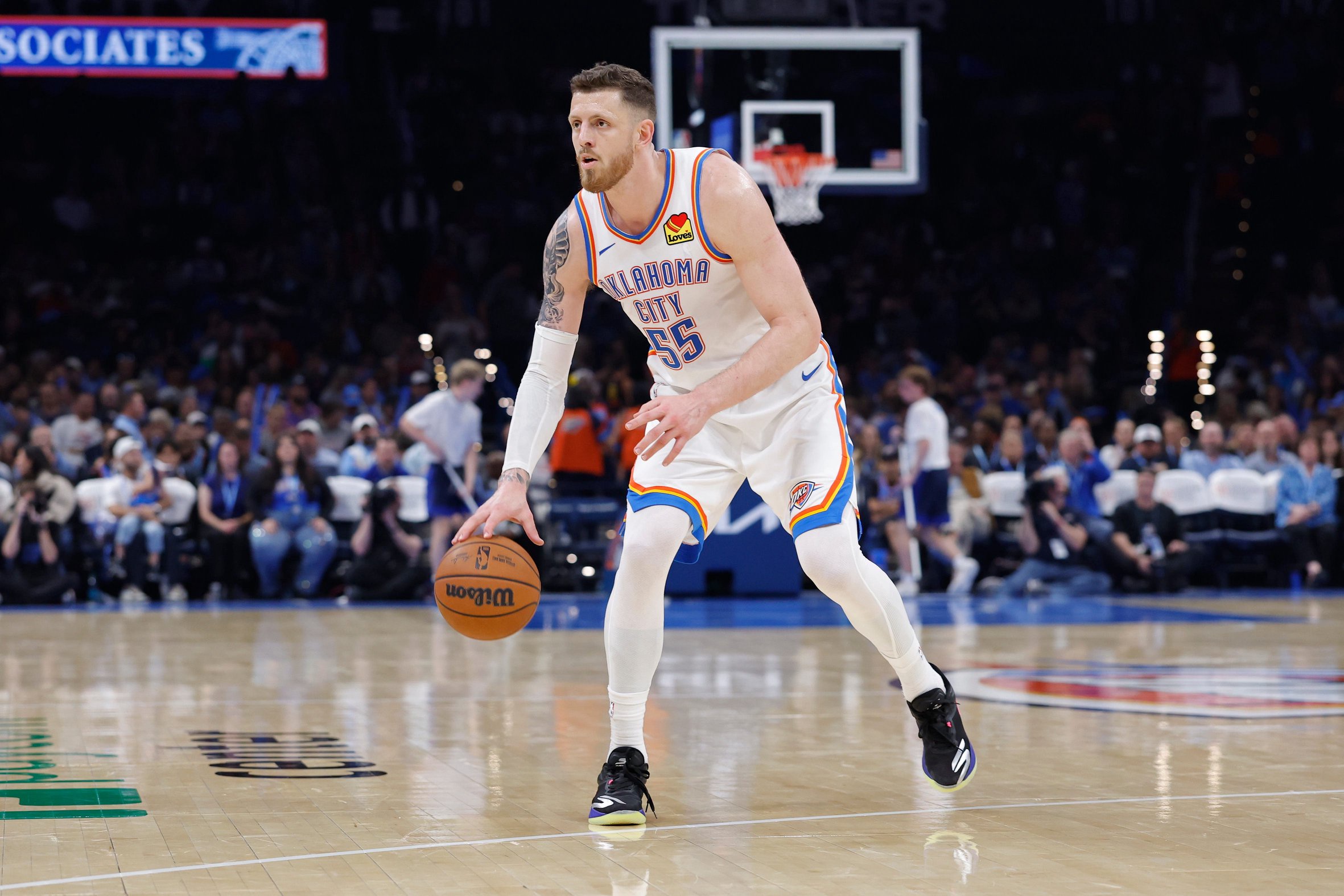 Oct 26, 2026; Oklahoma City, Oklahoma, USA; Oklahoma City Thunder center Isaiah Hartenstein (55) dribbles down the court against the Phoenix Suns during the second half at Paycom Center. Mandatory Credit: Alonzo Adams-Imagn Images