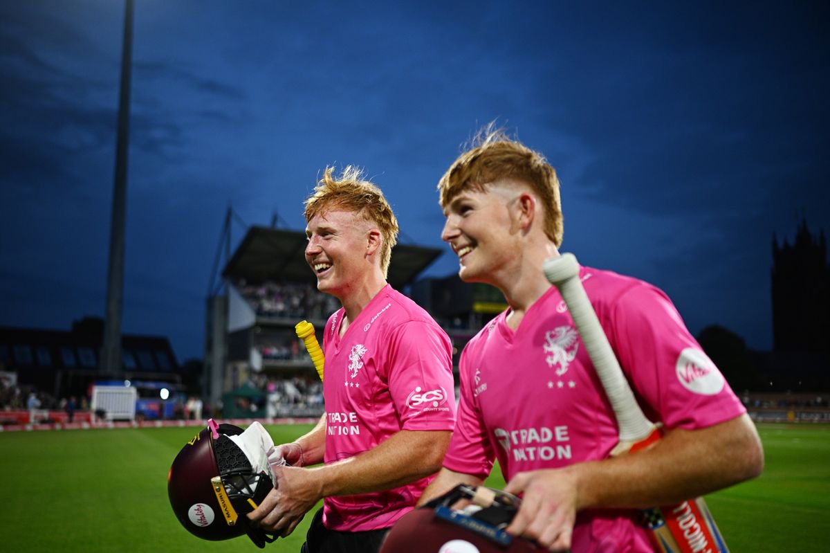 TAUNTON, ENGLAND - MAY 22: James Rew and Thomas Rew of Somerset celebrate following the Vitality Blast Men's match between Somerset and Hampshire Hawks at The Cooper Associates County Ground on May 22, 2026 in Taunton, England. (Photo by Harry Trump/Getty Images)