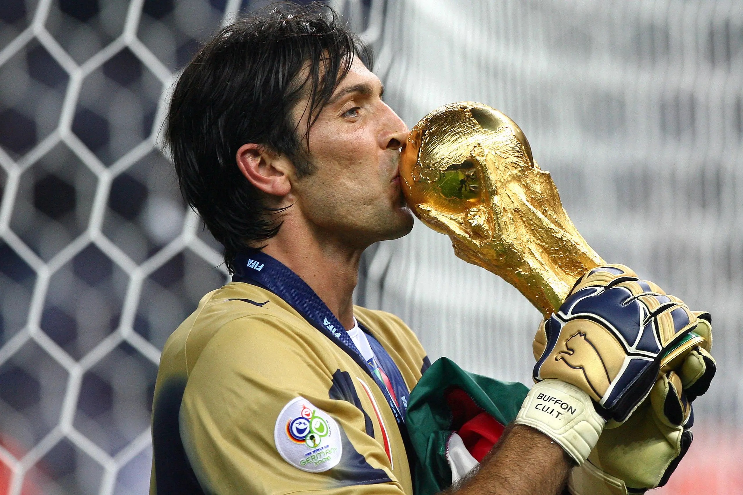 Gianluigi Buffon (ITA) celebrates with the trophy after the final of the 2006 FIFA World Cup between Italy and France.