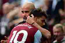 Manchester City's Spanish manager Pep Guardiola greets West Ham United's Brazilian midfielder #10 Lucas Paqueta during the English Premier League f...