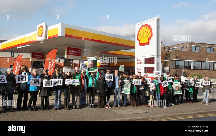 A protest takes place at a Shell garage in London to put pressure on energy  giant Gazprom to help free the Arctic 30, who have been detained on piracy  charges in Russia