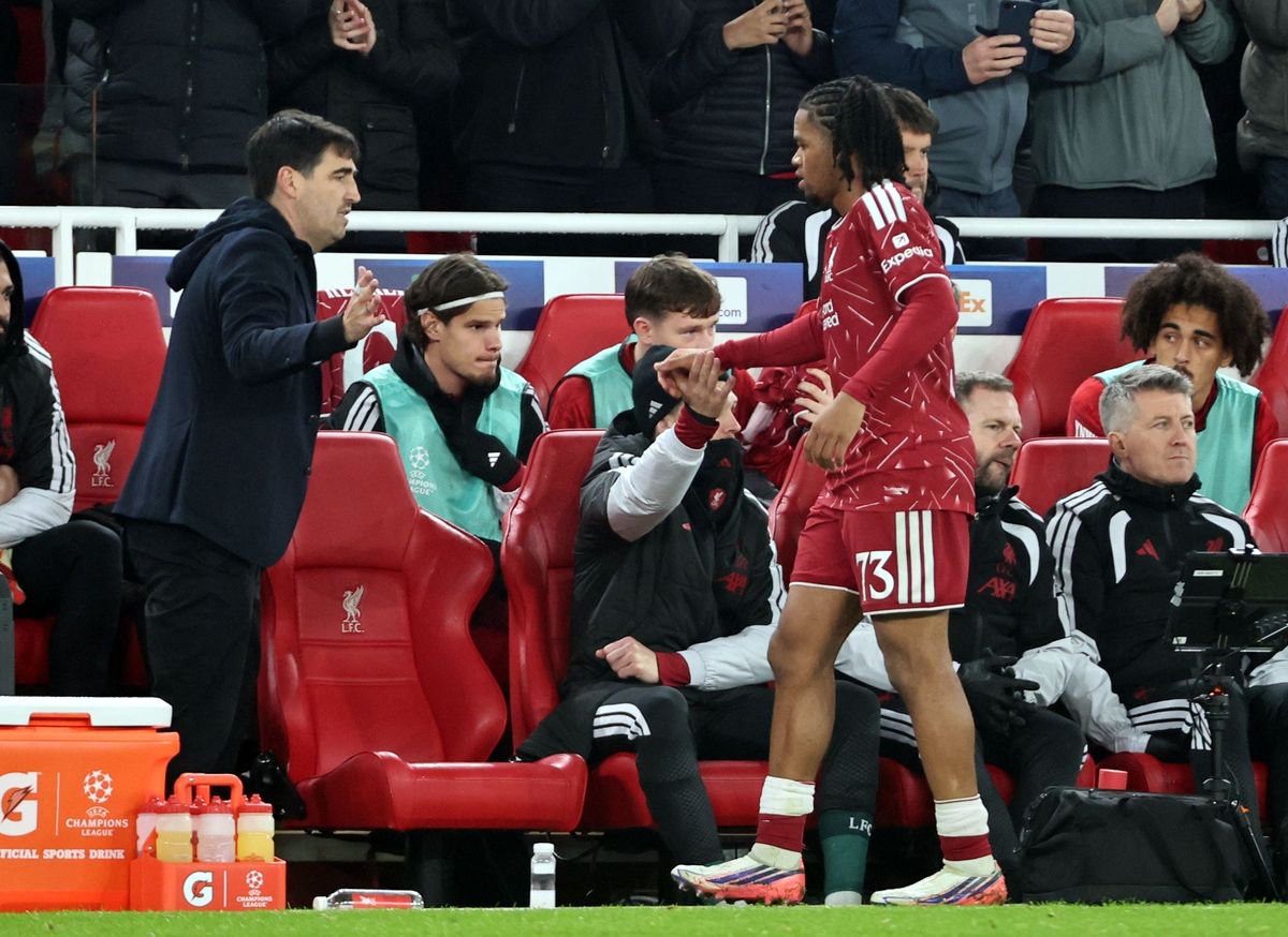Liverpool manager Andoni Iraola greets Rio Ngumoha as he is substituted in the second half having inspired Liverpool's comeback from 0-2 to win 4-3, at Anfiel