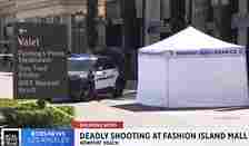 Pictures show a white police forensics tent in the parking lot at the scene of the attack