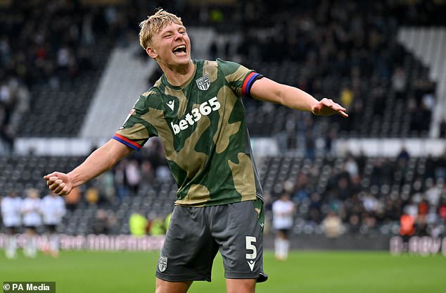 Luke Graham celebrates the winning goal (Bruce Rollinson/PA)