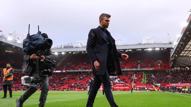 Michael Carrick leaves the pitch after his side suffered a 3-0 defeat to Bournemouth.