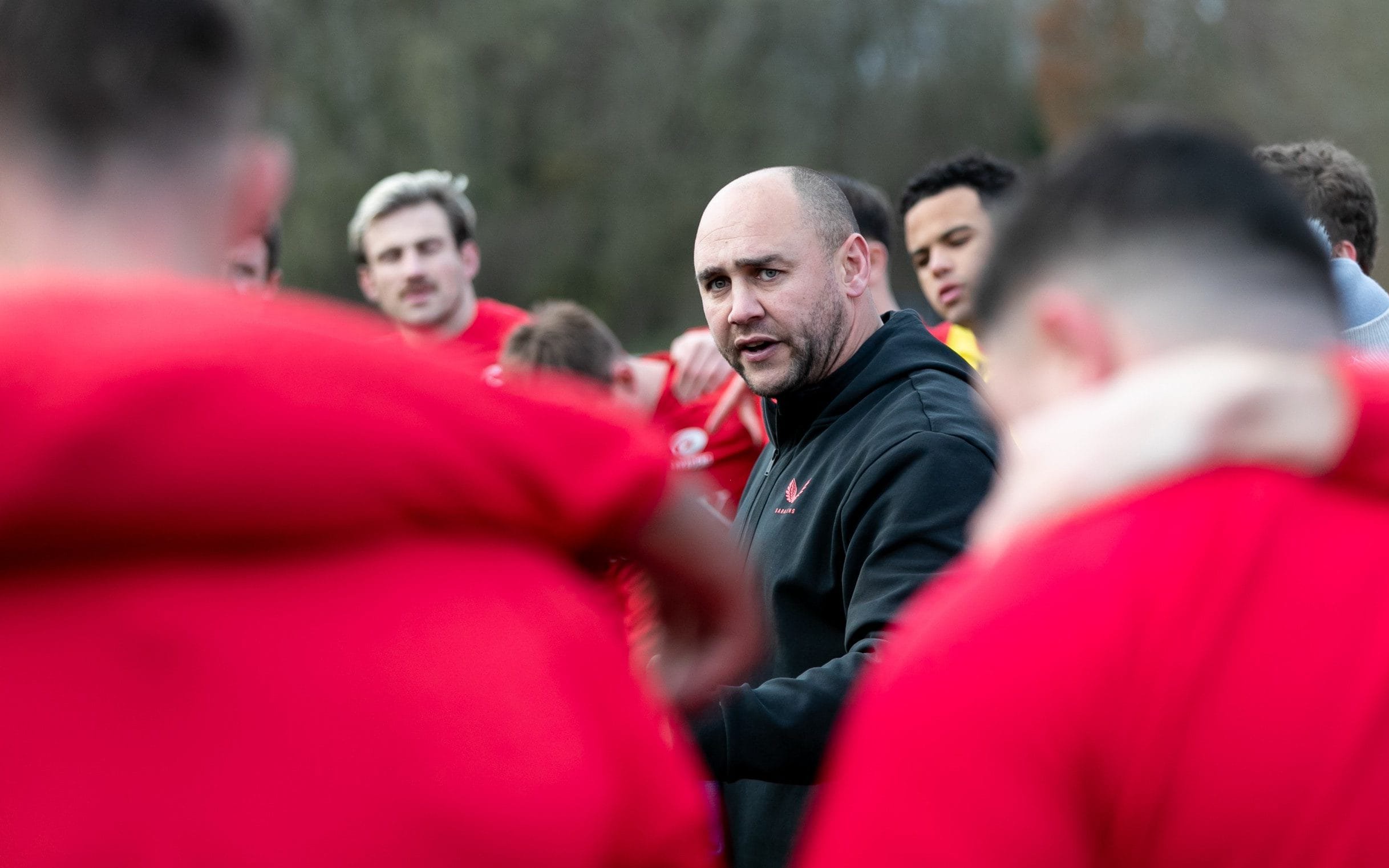 Shaw with the Saracens players