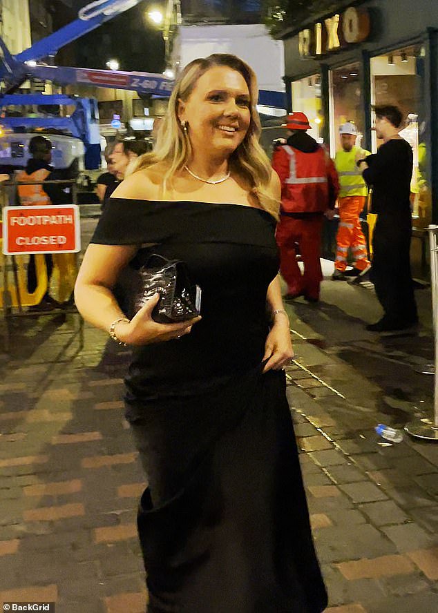 Katie cut a glamorous figure in an elegant black gown, while Harry sported a sharp tuxedo, with the addition of a £1 million Rolex watch, for the party