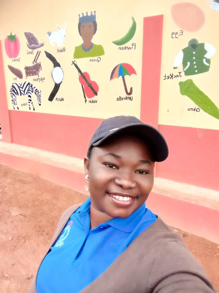 kind-hearted Kindergarten teacher paints and decorates school block by herself (photos)