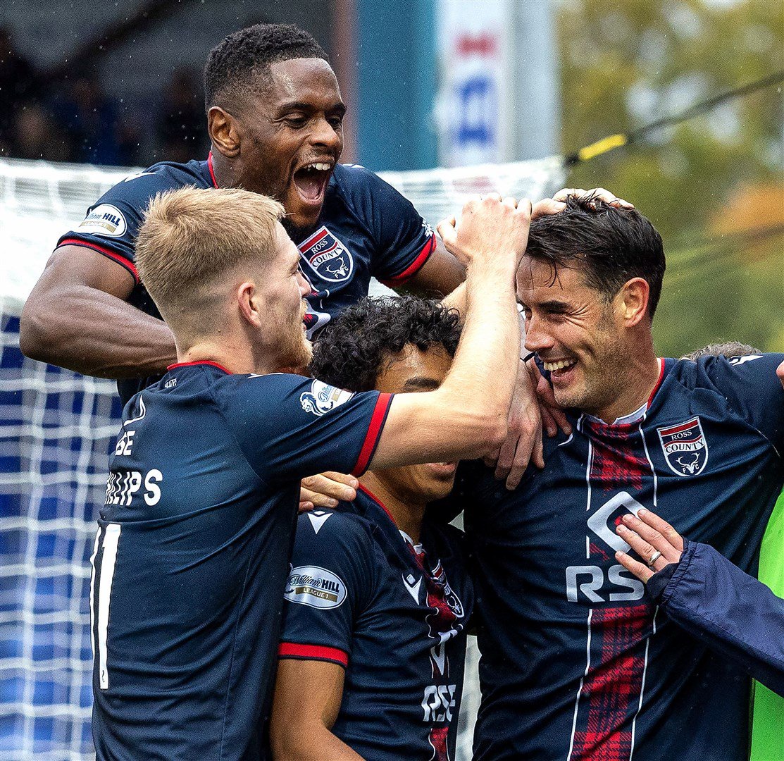 Ross County's Akil Wright joined in with celebrations for the second goal scored by Brian Graham. Picture: Ken Macpherson