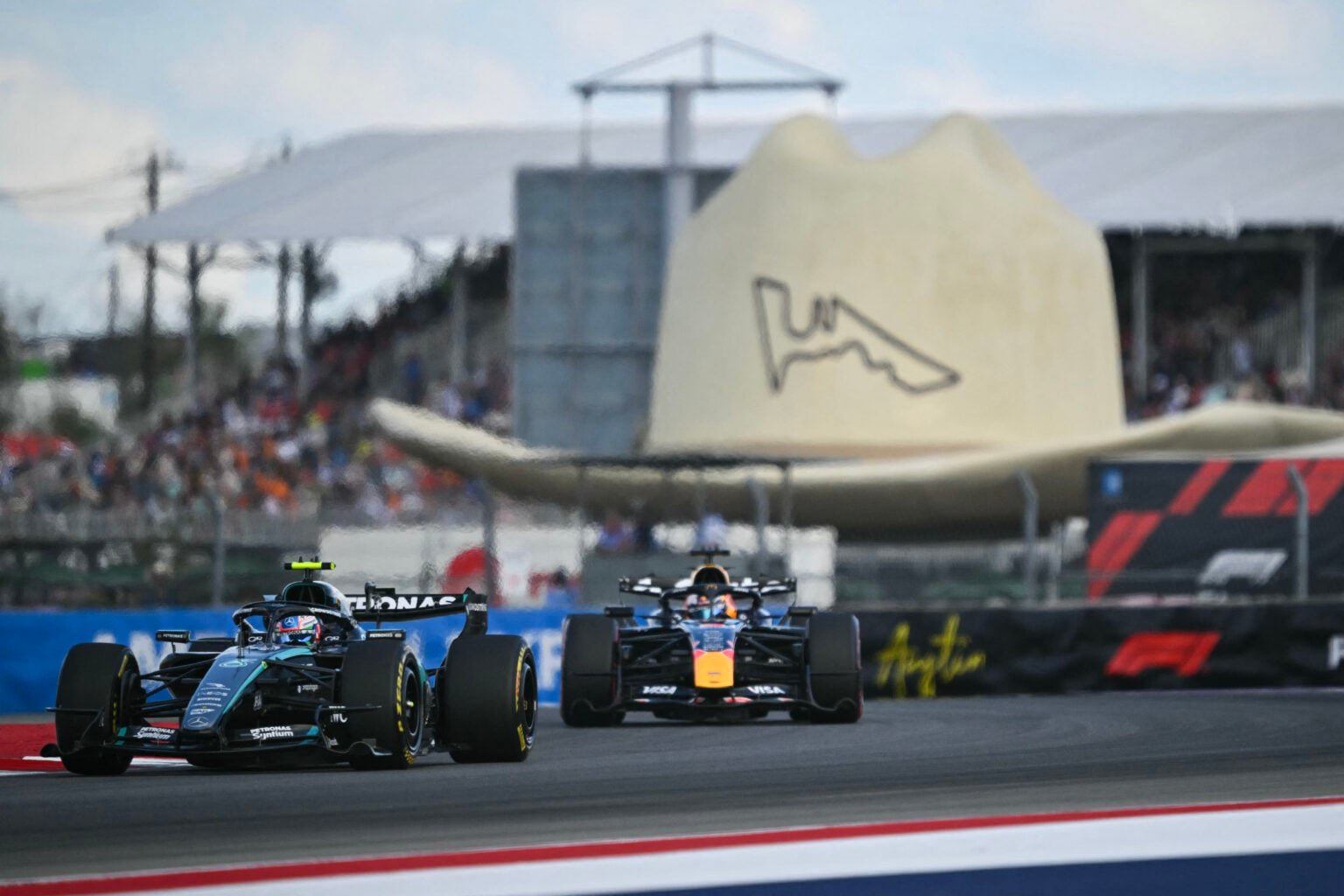 Mercedes' Andrea Kimi Antonelli leads Red Bull's Max Verstappen on track during qualifying for the 2026 F1 United States Grand Prix