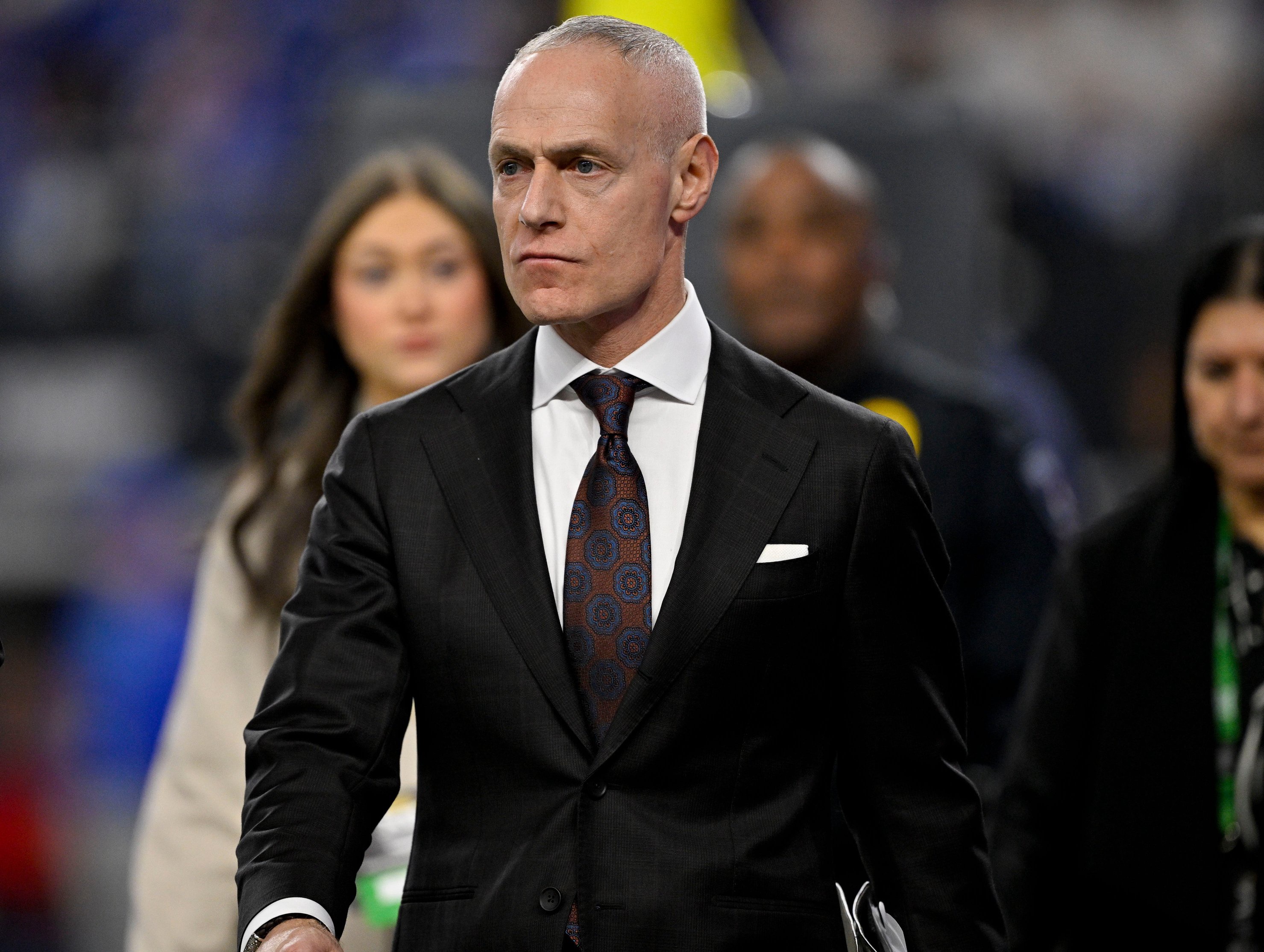 Big 12 commissioner Brett Yormark walks on the field during the 2026 Big 12 Conference title game at AT&T Stadium.