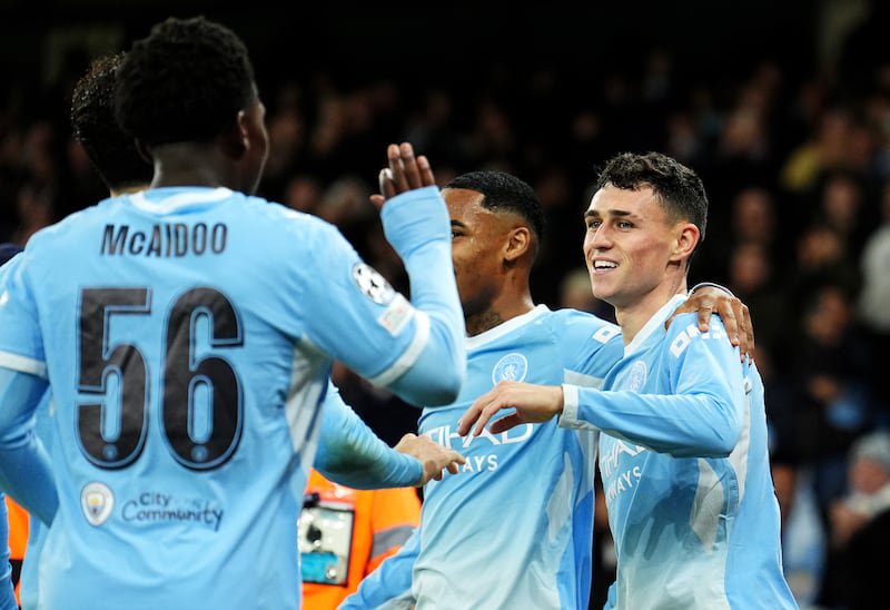 Manchester City’s Phil Foden celebrates scoring a hat-trick