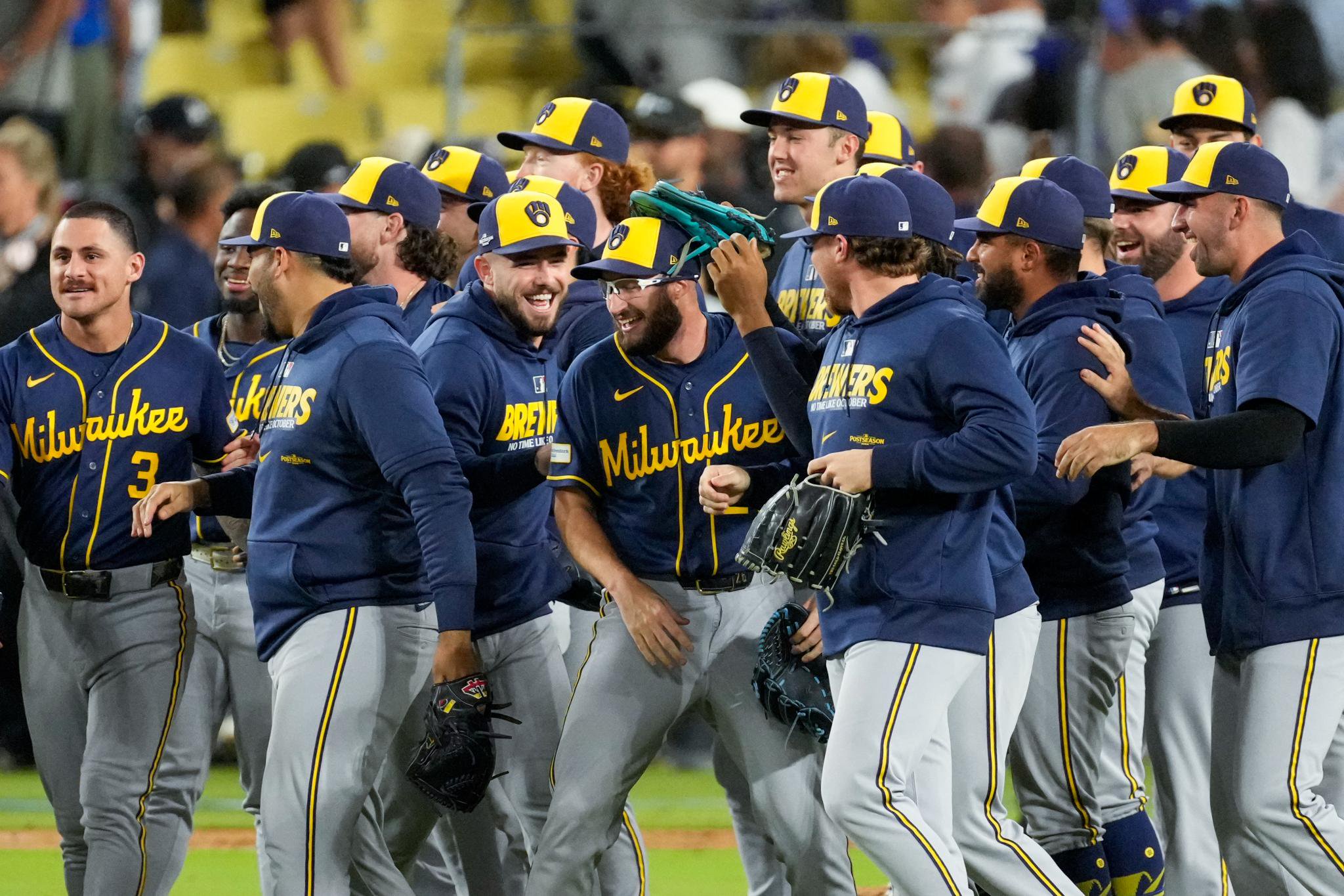 The Brewers celebrate after their NLCS-clinching win over the Dodgers in their Game 4 sweep.