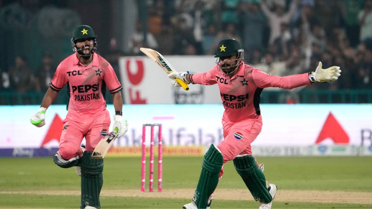 Shadab Khan and Haris Rauf celebrate Pakistan’s victory.