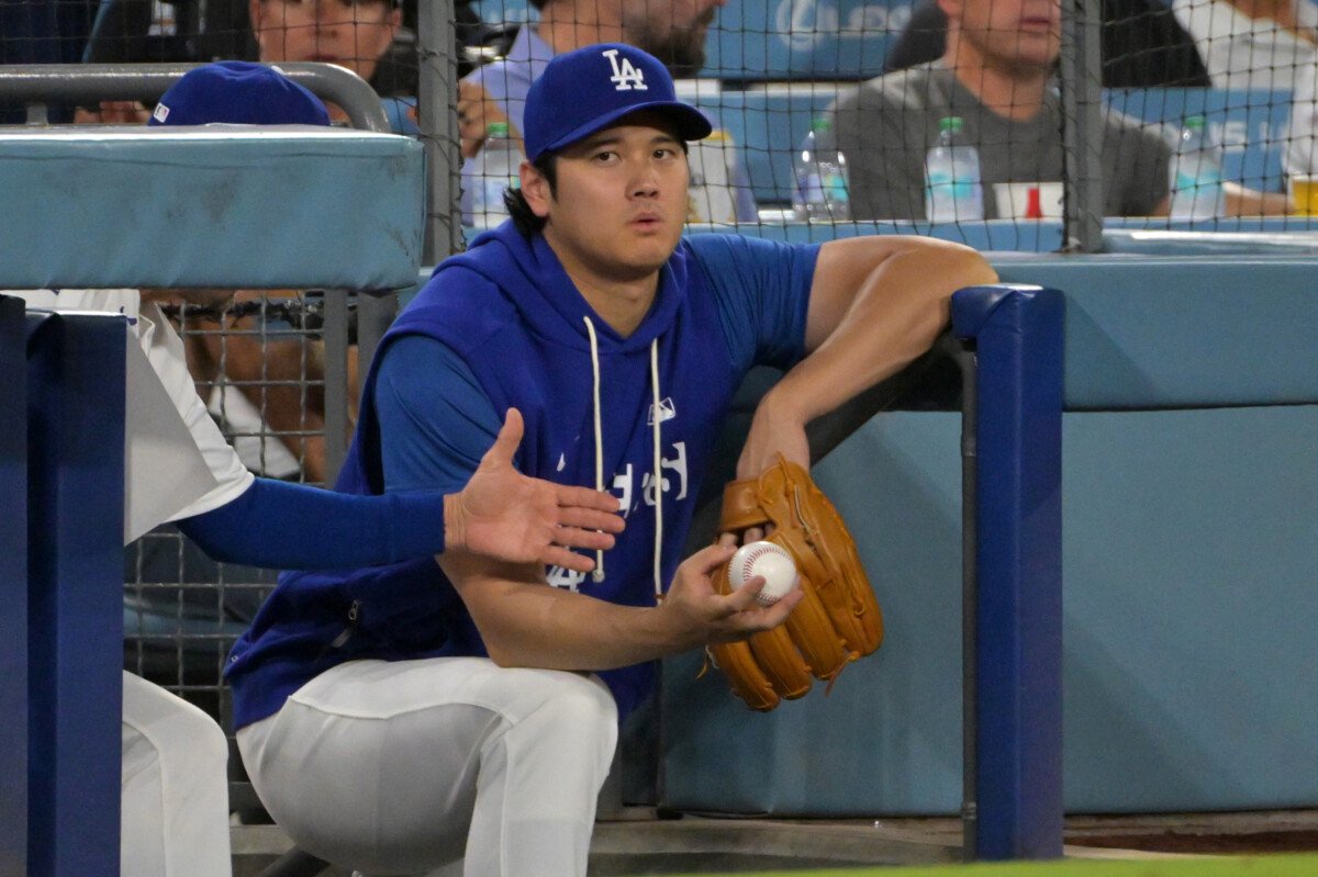 Sep 8, 2026; Los Angeles, California, USA; Los Angeles Dodgers designated hitter Shohei Ohtani (17) looks on from the dugout steps against the Cincinnati Reds at Dodger Stadium. Mandatory Credit: Jayne Kamin-Oncea-Imagn Images