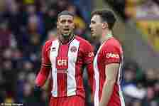 Vini Souza appeared to shove Sheffield United team-mate Jack Robinson in the face after squabbling over conceding a goal