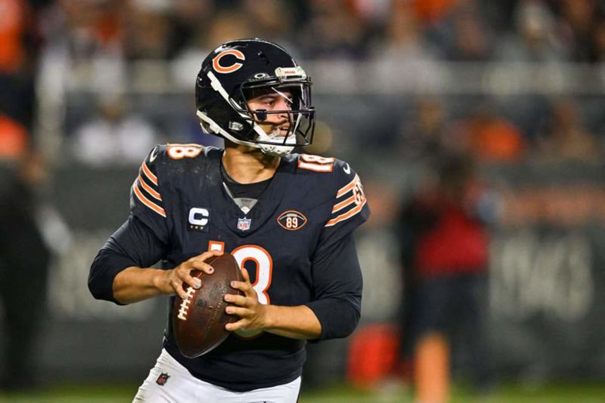 Oct 22, 2026; Chicago, Illinois, USA; Chicago Bears quarterback Caleb Williams (18) looks to pass against the New England Patriots during the fourth quarter at Soldier Field. © Patrick Gorski-Imagn Images
