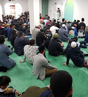 Shah leading prayers at his community mosque