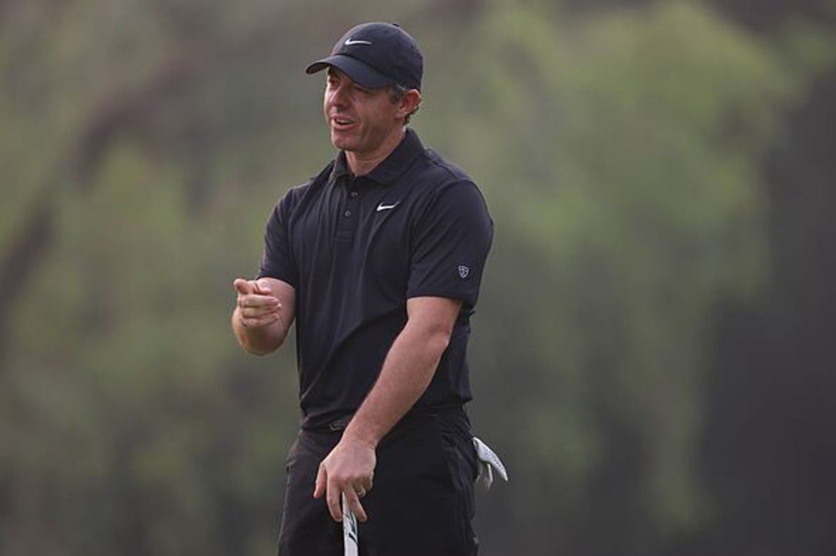 Rory McIlroy looks on