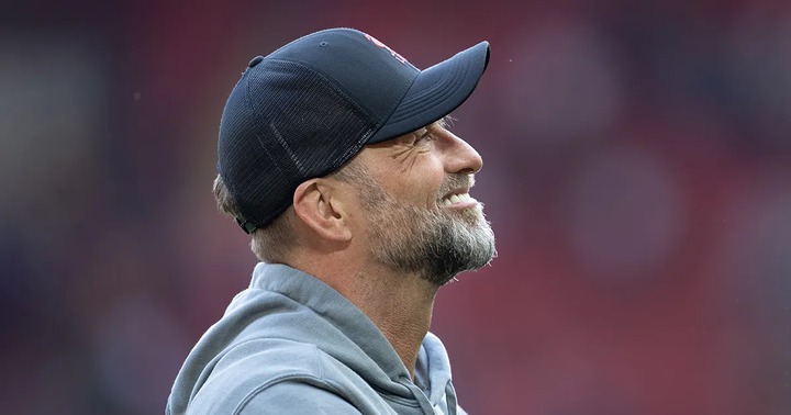 Liverpool manager Jurgen Klopp waves to fans after the Premier League match between Liverpool FC and Aston Villa at Anfield on May 20, 2023 in Liverpool, England.